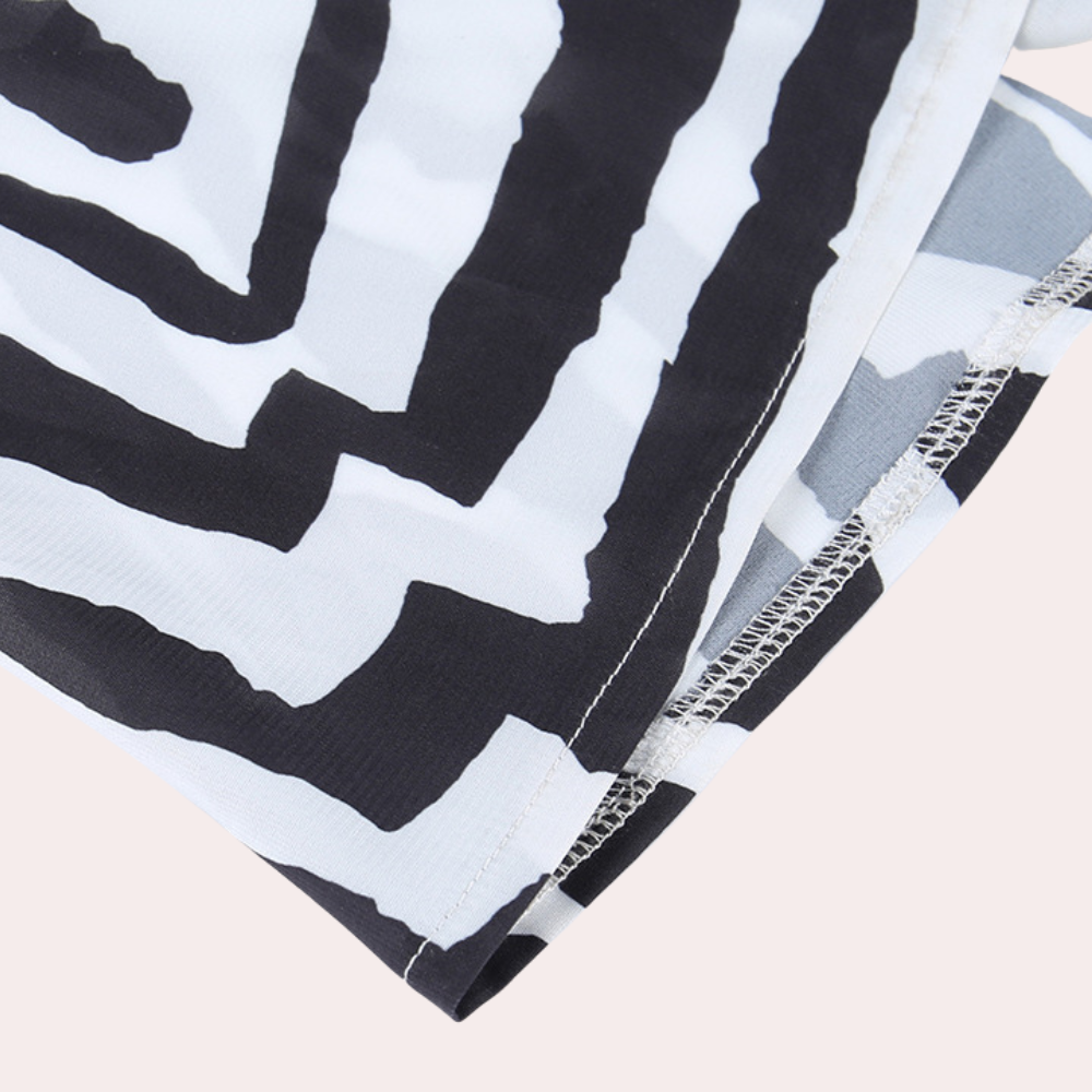 Tara - Striking Backless Maxi Dress featuring Bold Zebra Stripes