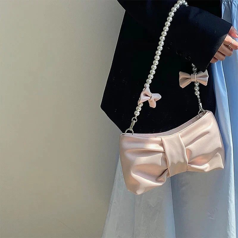 Elegant Satin Clutch with Exquisite Pearl Handle