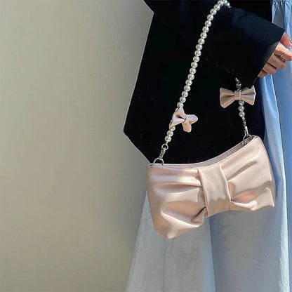Elegant Satin Clutch with Exquisite Pearl Handle