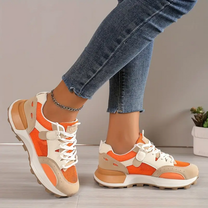 Kaitlyn's Vibrant Orange Sneakers