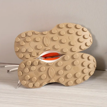 Kaitlyn's Vibrant Orange Sneakers