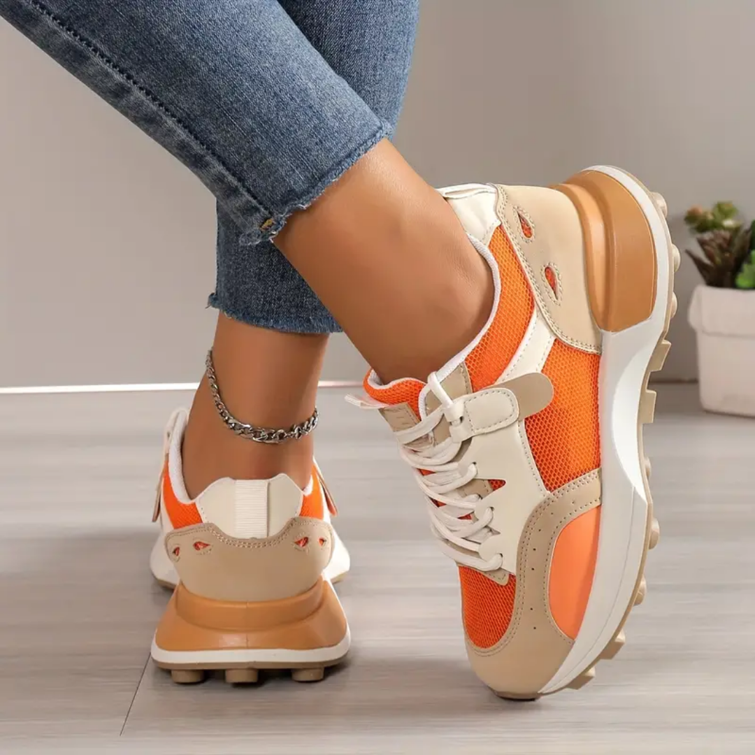 Kaitlyn's Vibrant Orange Sneakers