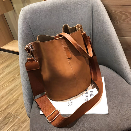 Chic Tan Leather Bucket Bag - Stylish Adjustable Strap for the Modern Woman