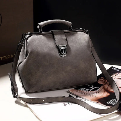 Elegant Handbag with Chic Metal Clasp