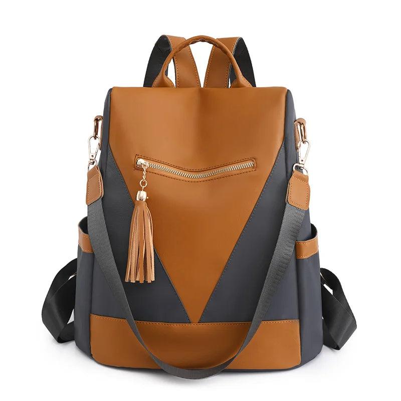 Chic Two-Tone Backpack with Stylish Tassel Pendant