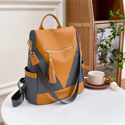 Chic Two-Tone Backpack with Stylish Tassel Pendant