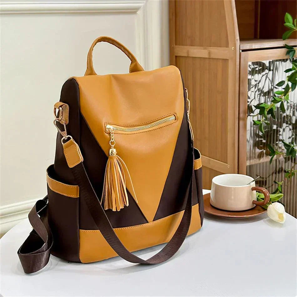 Chic Two-Tone Backpack with Stylish Tassel Pendant