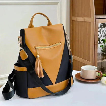 Chic Two-Tone Backpack with Stylish Tassel Pendant