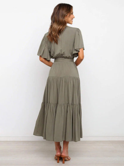 Chic Bohemian Midi Dress with V-Neck and Flowy Tiered Skirt